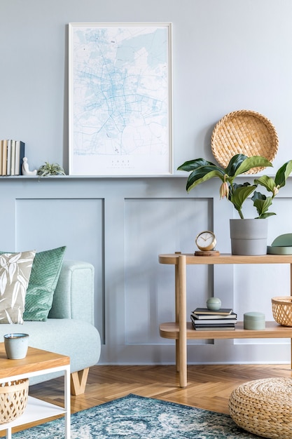 Stylish interior of living room with mock up poster frame, design sofa, coffee table, console, plant, carpet, pillows, plaid, books, clock and elegant personal accessories in modern home decor.