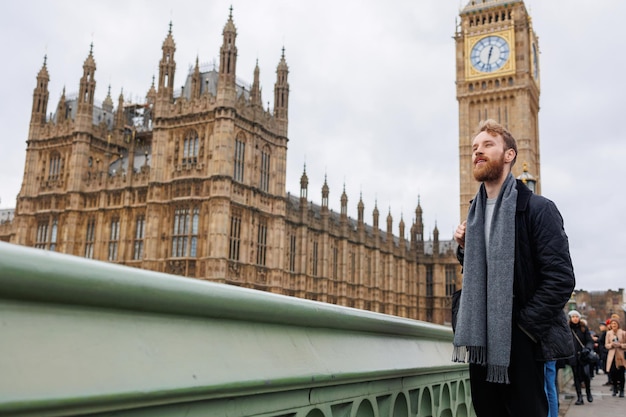 Stylish male tourist on the background of London Big Ben