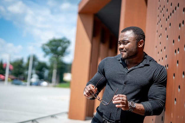 Stylish man in black shirt Lifestyle trendy male model in casual clothing