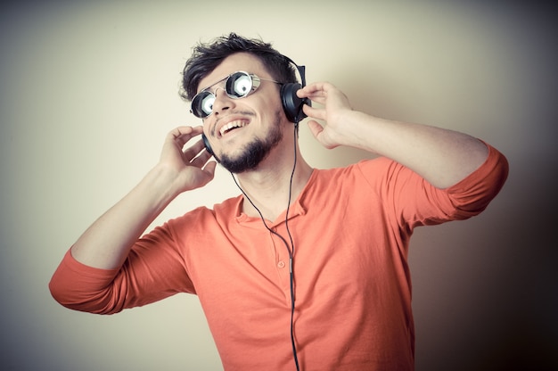 Stylish man listening to music