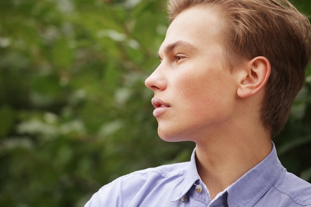 Stylish man portrait in summer park