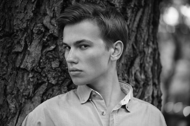 Stylish man portrait in summer park