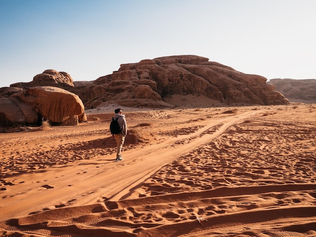 Stylish man and the sights of the Wadi Rum