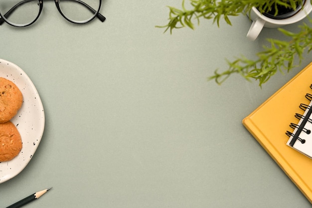 Stylish modern workspace office desk with mockup space on grey background and office accessories