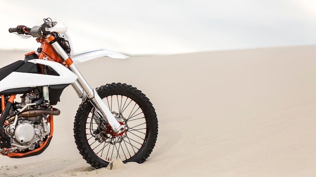 Stylish motorcycle parked in the desert