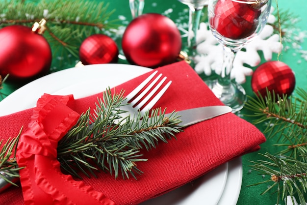 Stylish red, green and white Christmas table setting