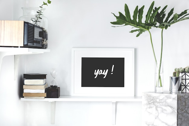 Stylish scandinavian interior with white shelf