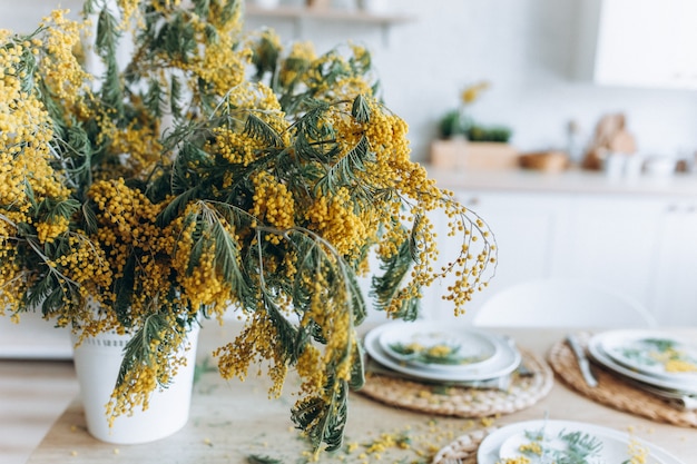 Stylish spring table setting in kitchen