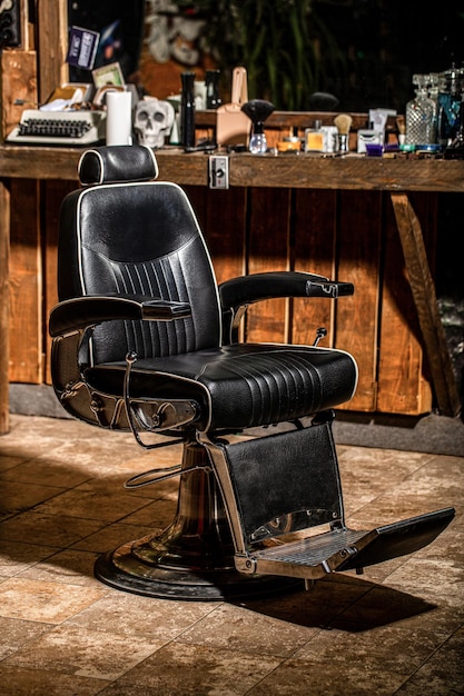 Stylish vintage barber chair Professional hairstylist in barbershop interior Barber shop chair Barbershop armchair modern hairdresser and hair salon barber shop for men