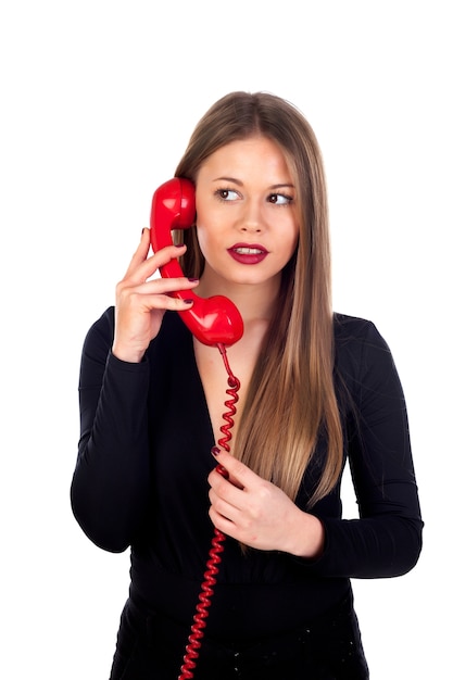 Stylish woman with a red phone