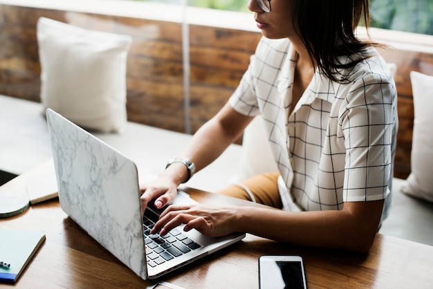 Stylish woman working on a laptop