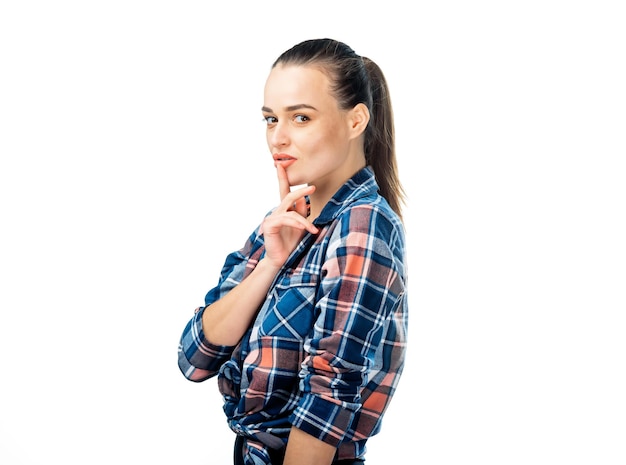 Stylish young brunette model showing emotes Pretty lady in checkered shirt