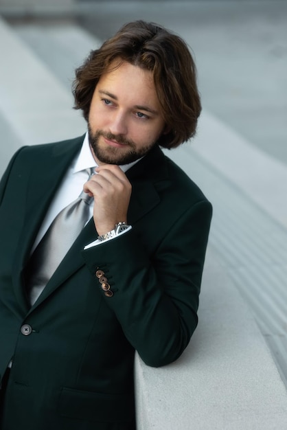 Stylish young man in suit and tie. Business style. Handsome man.