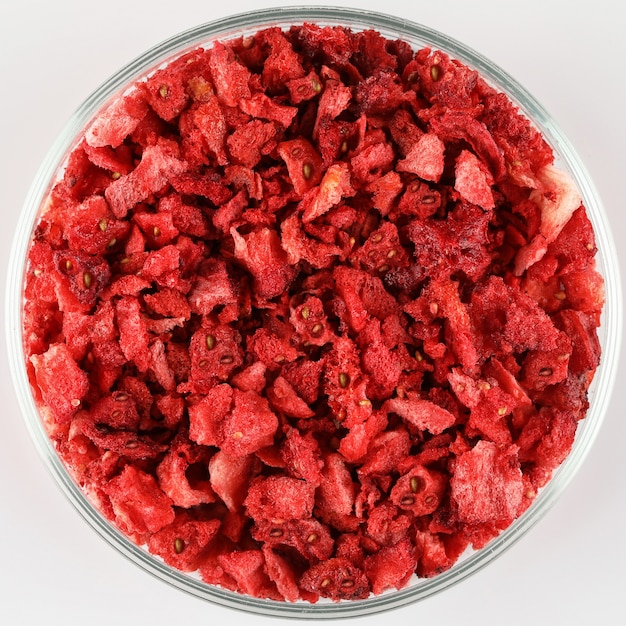 Sublimed dried strawberry pieces on plate