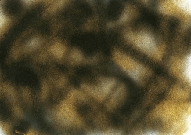 Subtle noise black and gold spray paint texture