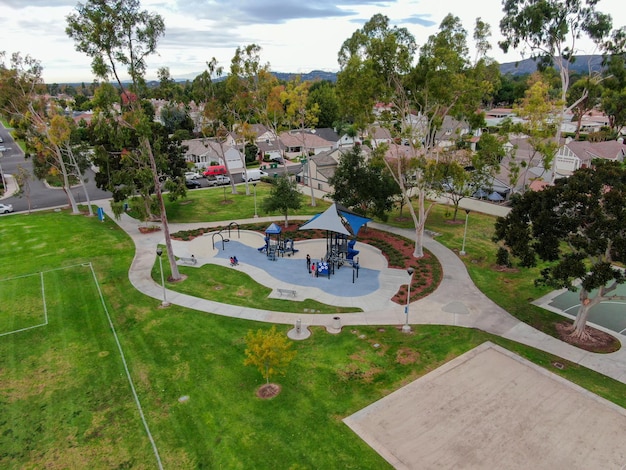 Suburban packed homes neighborhood with small park Vast subdivision in Irvine California USA