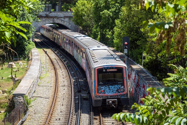 Subway train painted with graffiti in Athens Greece Europe