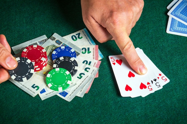 Success in winning on the table in a poker club with a combination of cards three of a kind or set