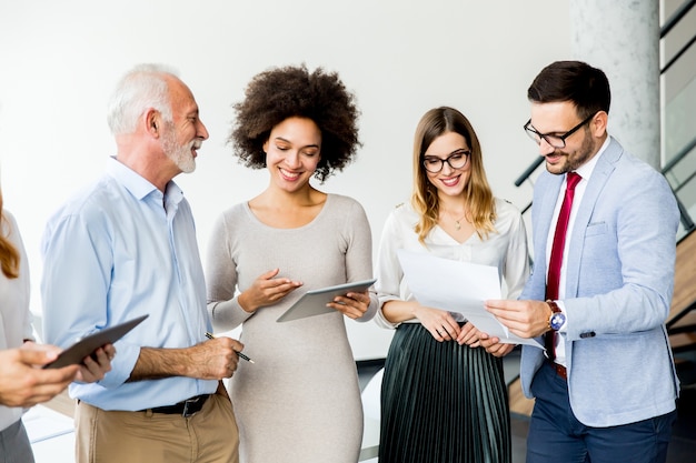 Successful business people standing in the office