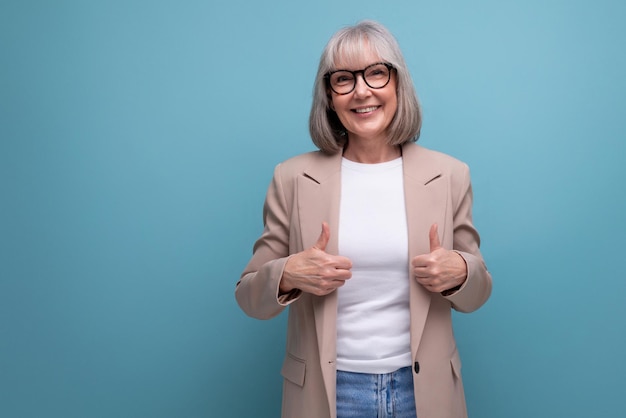 Successful business s woman in stylish look on studio background with copy space