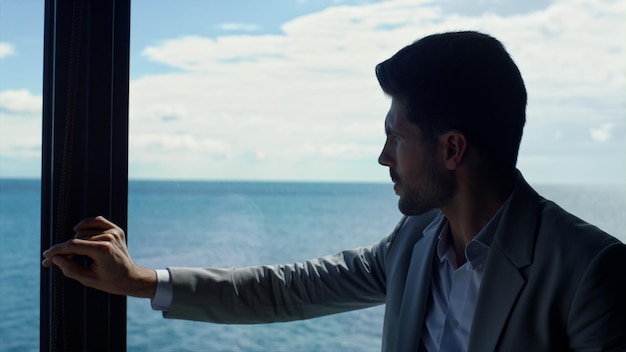 Successful businessman watching sea view Man ceo thinking analyzing problems