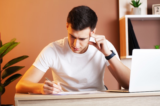 Successful businessman working in the office at the computer