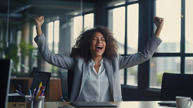 Successful businesswoman raises her hands up rejoices in increasing profits in business Businesswoman is receiving good news online raising her hands and showing her fists