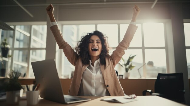 Successful businesswoman raises her hands up rejoices in increasing profits in business Businesswoman is receiving good news online raising her hands and showing her fists