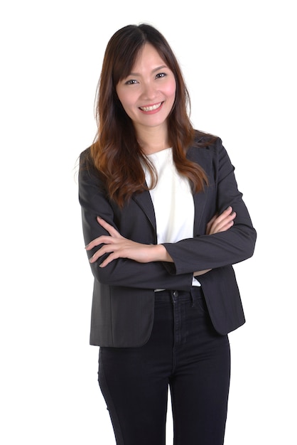 Successful businesswomen smile and crossed her arms on white