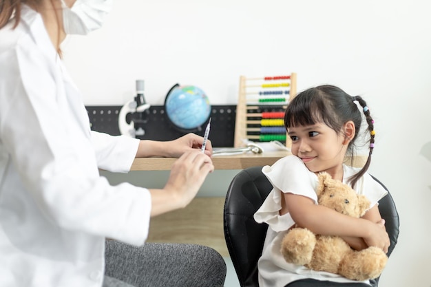 Successful covid19 vaccination cute little girl while being immunized against coronavirus