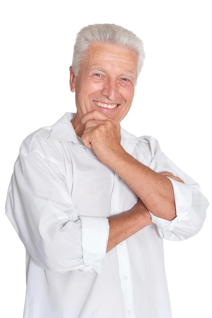 Successful senior man in white shirt posing