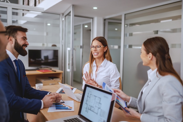 Successful team having meeting in boardroom. Don’t raise your voice, improve your argument.