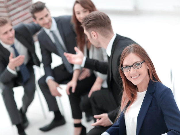 Successful young business woman on the background of the office