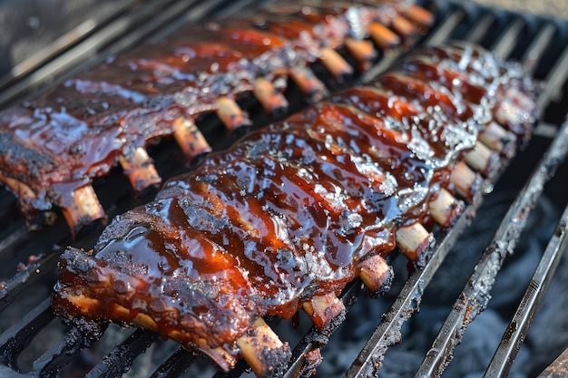 Succulent barbecued ribs covered in a glossy glaze presented on a wooden cutting board ready to be served