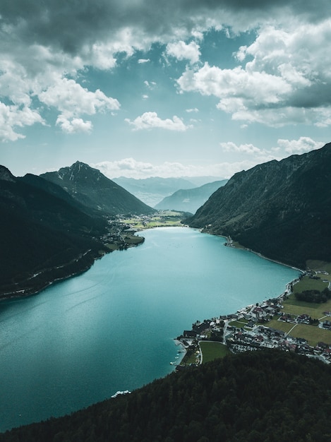 A sudden rain cloud approaches the Achen mountain lake in Tyrol, Austria.