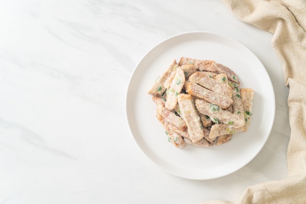 Sugar Coated Taro or Crispy Sweet Snow Taro on plate