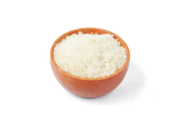 Sugar with a wooden bowl isolated on a white background