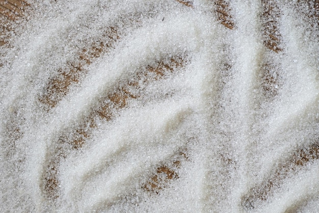 Sugar on wooden background white sugar for food and sweets dessert candy heap of sweet sugar crystalline granulated