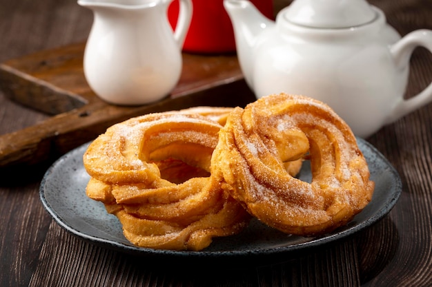 Sugared donuts on the table Brazilian donuts