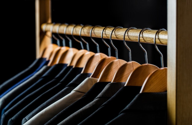 Suits for men hanging on the rack