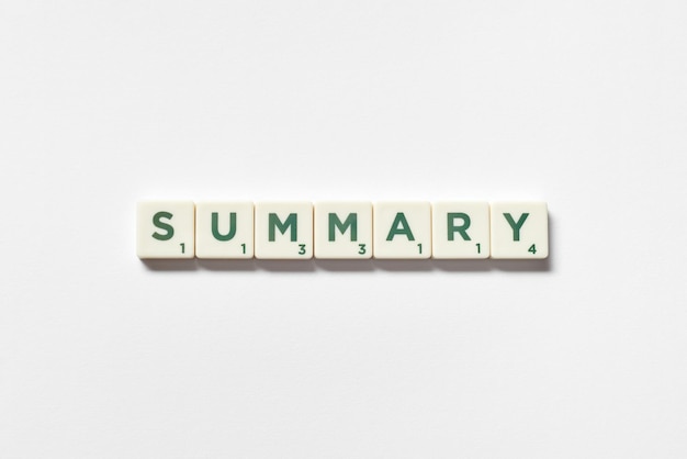 Summary formed of scrabble blocks on white background