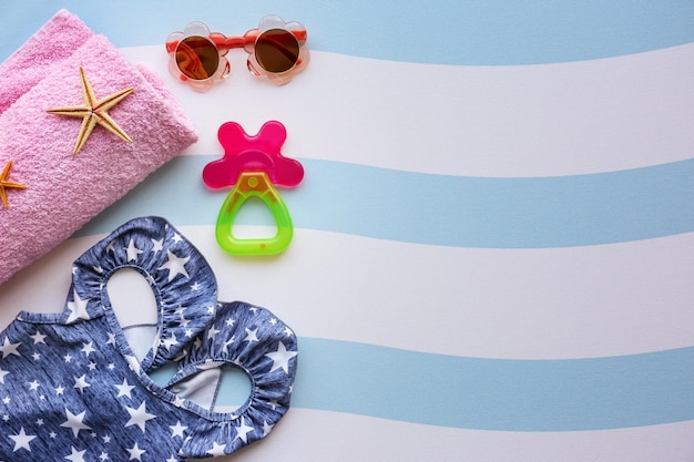 Summer accessories on color background Holiday concept