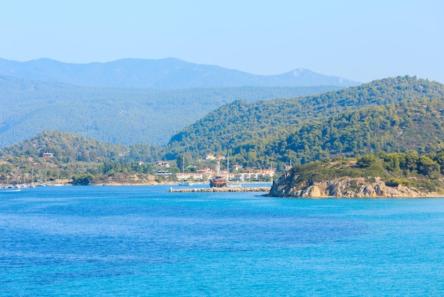 Summer Aegean sea coast landscape (Ormos Panagias, Halkidiki, Greece).