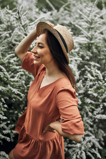 Summer background. Beautiful young girl in blooming shits