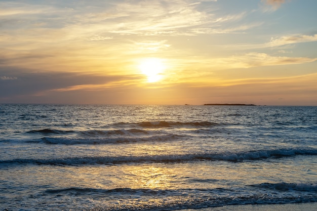 Summer background with tropical beach during sunset