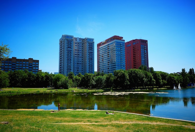 Summer city park with small pond