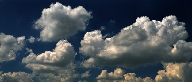 Summer clouds flying in the deep blue sky