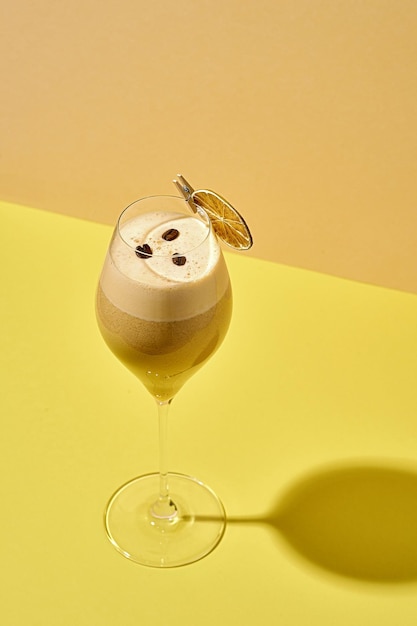 Summer coffee cocktail on a yellow background