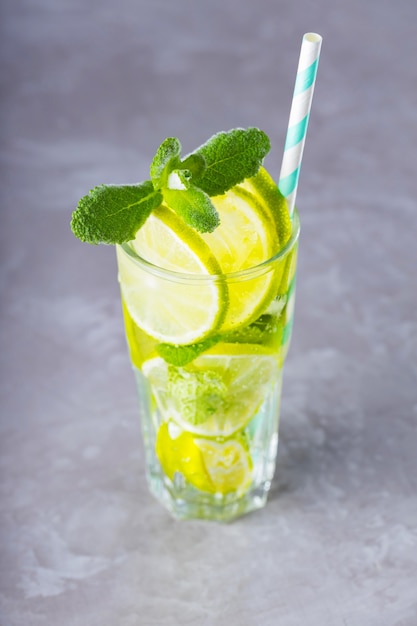 Summer drink with lime, mint and ice