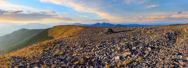 Summer evening Carpathian mountain top view from stony summit of Ihrovets Mount Gorgany Ukraine Sunset panorama